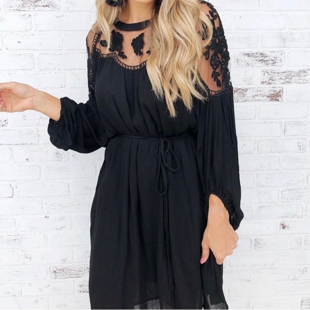 Beautiful black dress with sheer floral detail